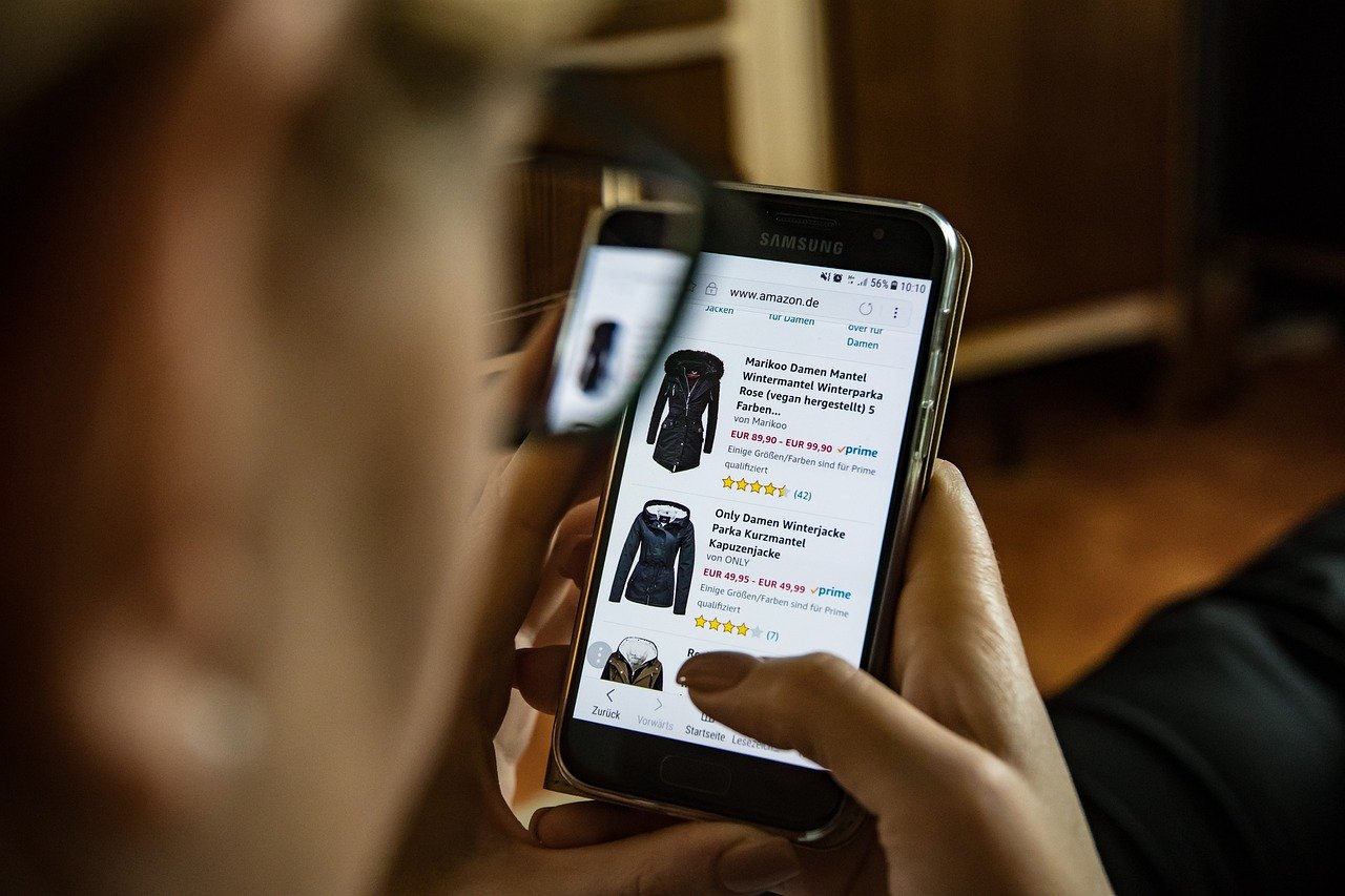 A woman searching clothes online